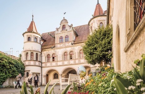The richly decorated historic town hall of Konstanz with its painted facade and half-timbered architecture