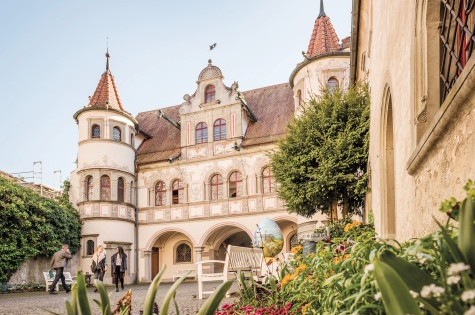 The richly decorated historic town hall of Konstanz with its painted facade and half-timbered architecture