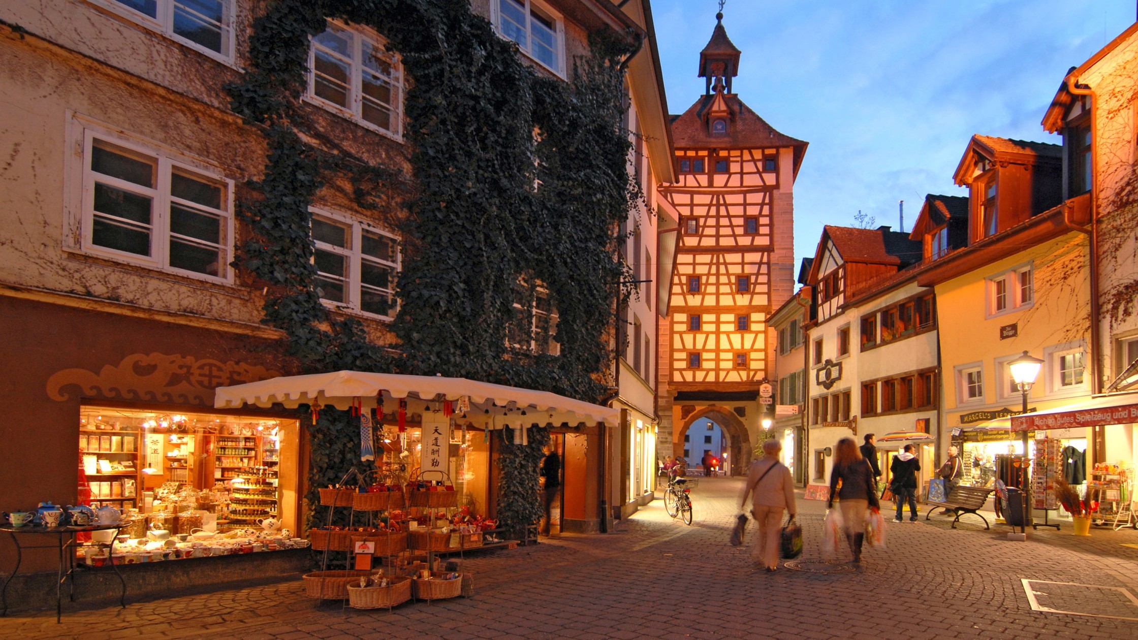 Historic city gate Schnetztor in Konstanz featuring a prominent tower and medieval half-timbered architecture