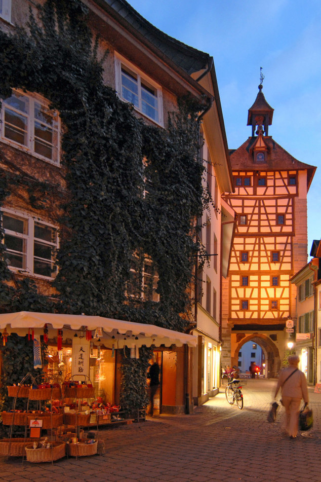 Historic city gate Schnetztor in Konstanz featuring a prominent tower and medieval half-timbered architecture