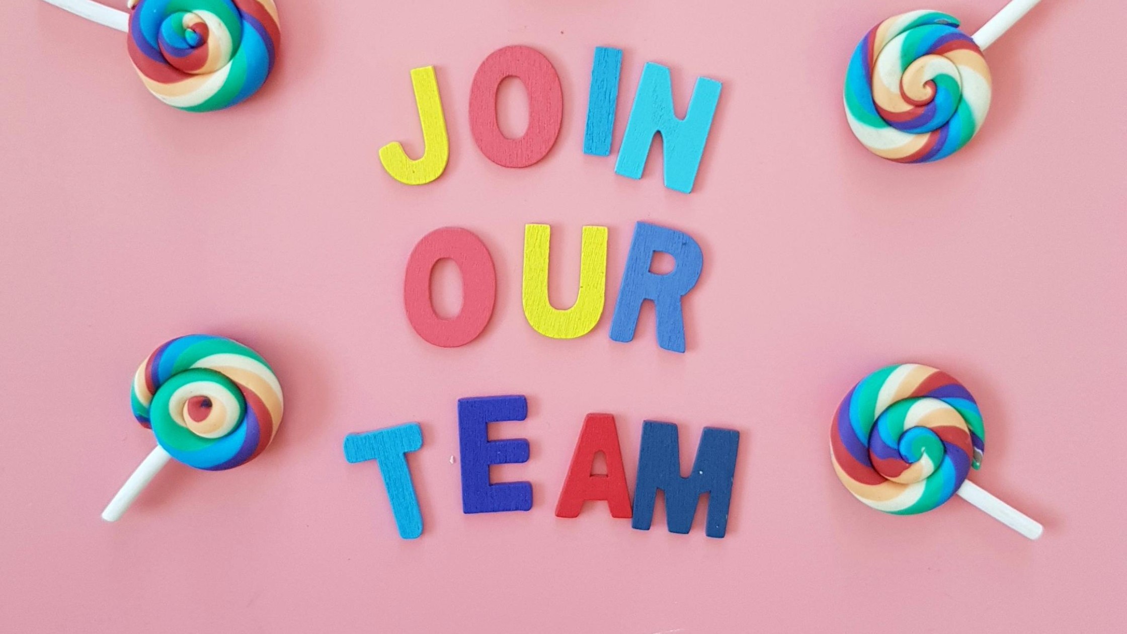 “Join our Team” in pink with candy decoration