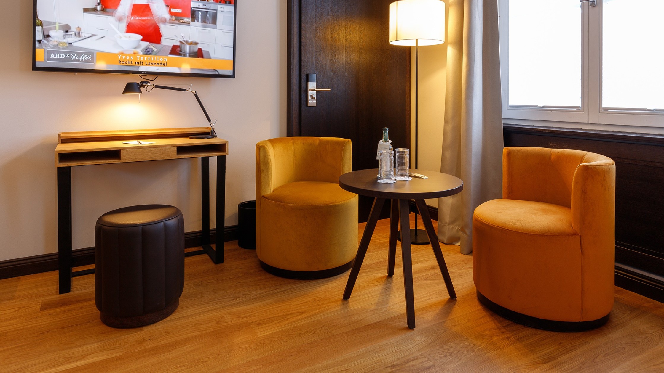 Stylish Superior double room at Hotel Alte Post Konstanz featuring air conditioning, double bed, hardwood flooring, and premium amenities